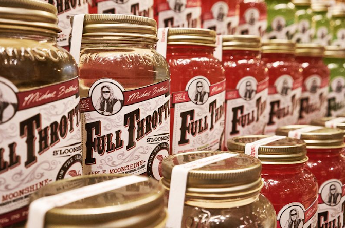 Jars of Full Throttle S'loonshine artisanal and small-batch spirits displayed on a store shelf