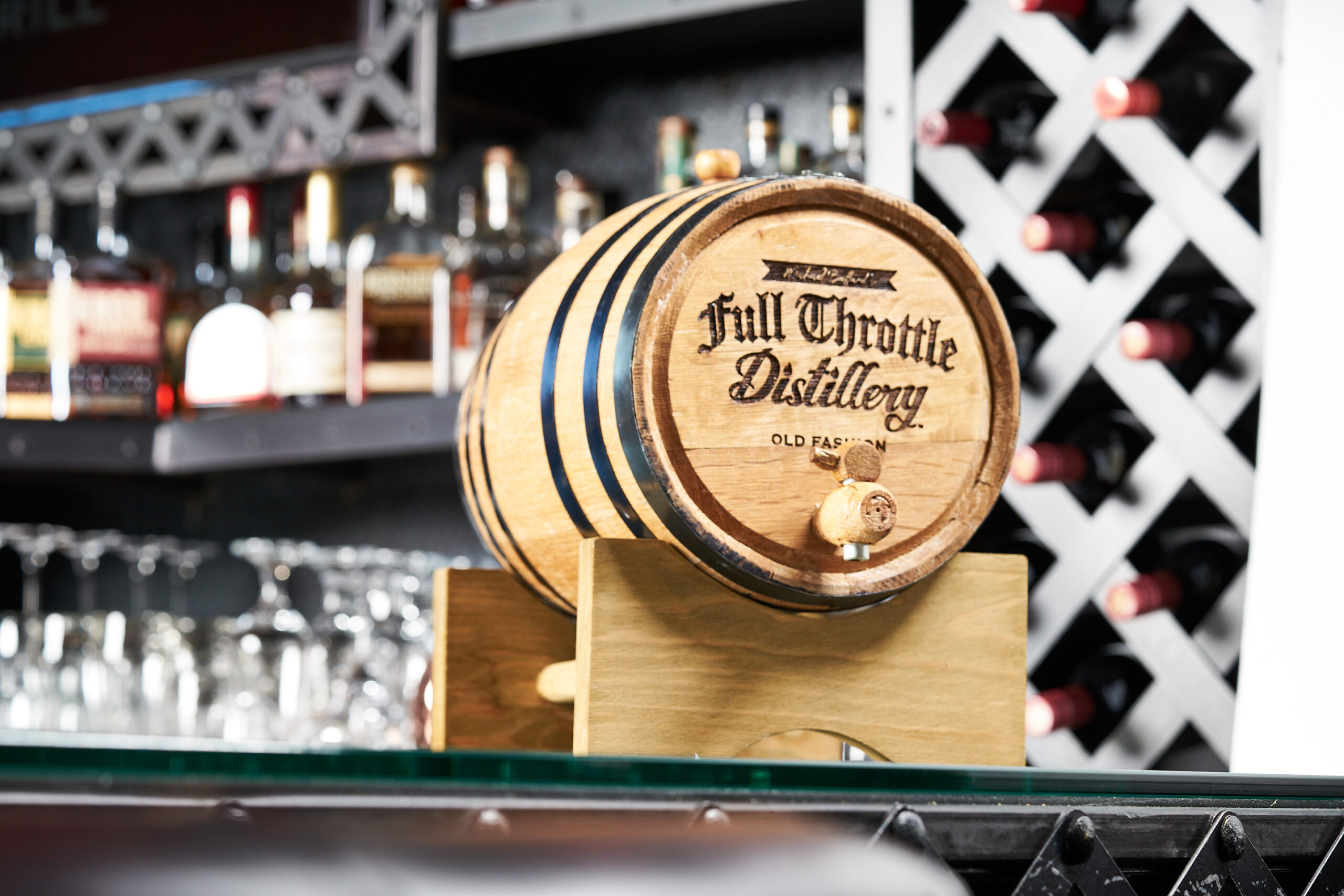 Mini oak barrel labeled Full Throttle Distillery used for aging small-batch barrel-aged whiskey