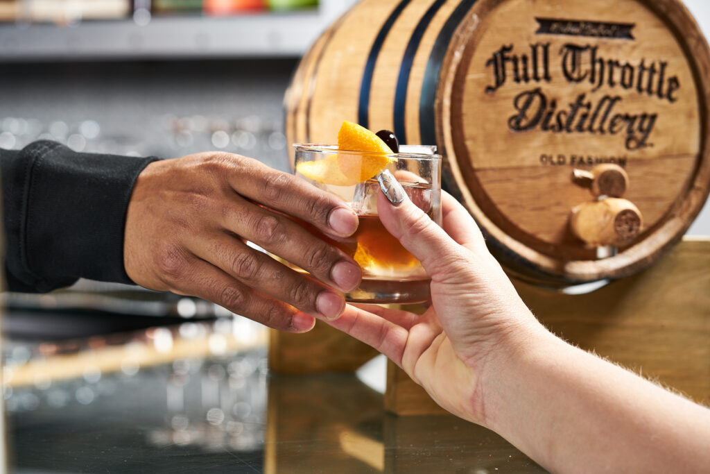 Sip Local Whiskey at Full Throttle – What You Can Do in Deadwood Old fashioned whiskey cocktail served at Full Throttle Distillery in Deadwood
