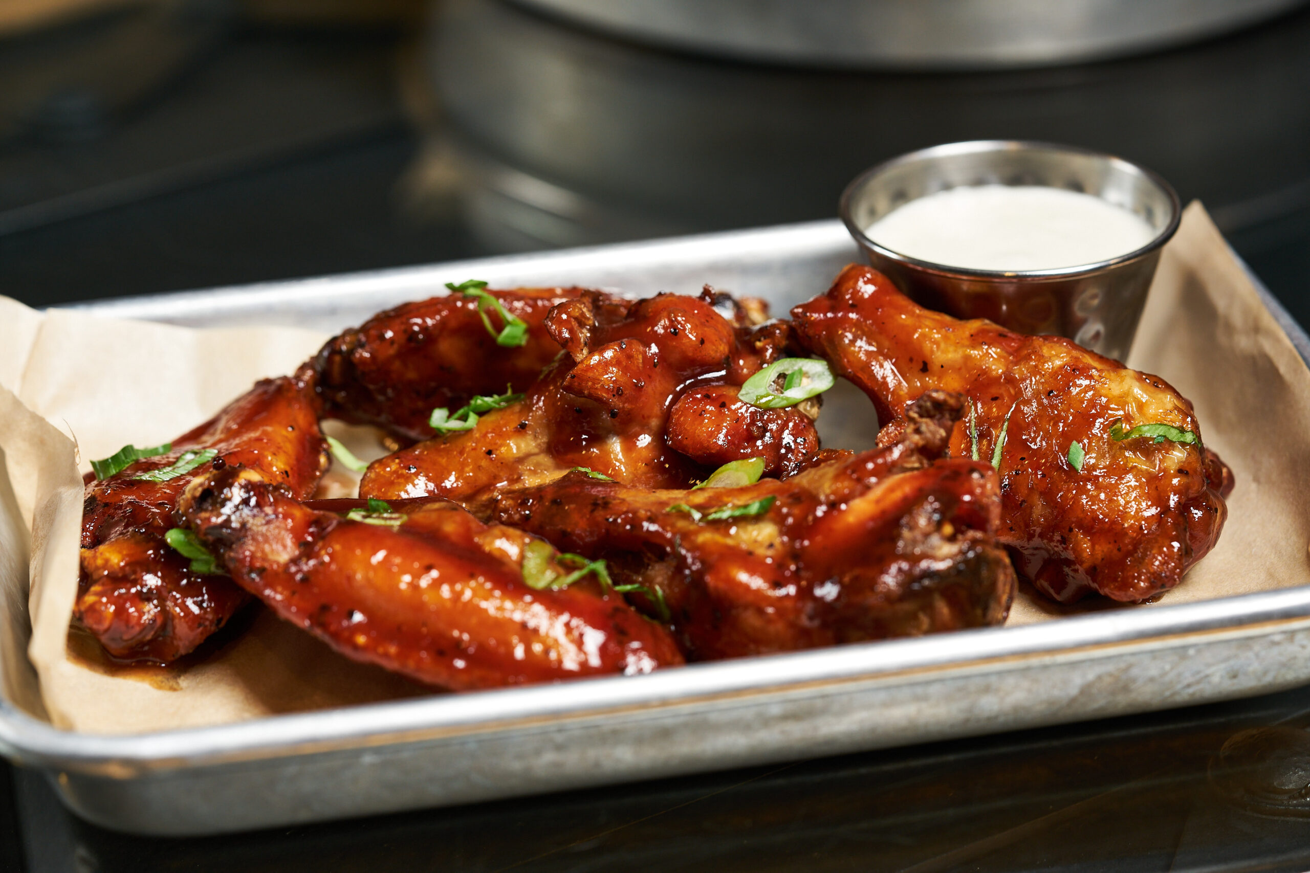 BBQ chicken wings with dipping sauce served during catering at Full Throttle Distillery in Branson