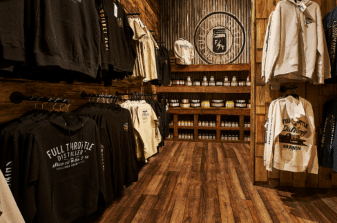 Full Throttle Distillery whiskey and branded merchandise with festive decor, perfect as gift ideas for the holidays.