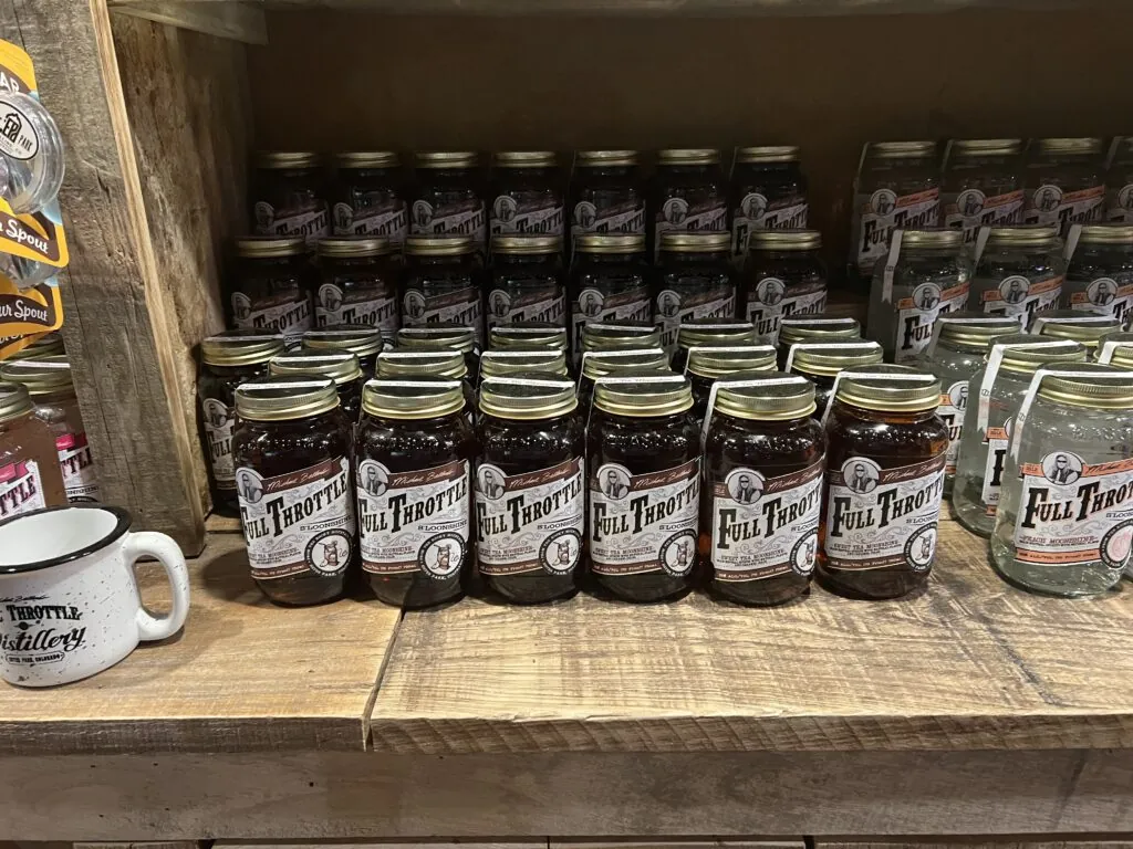 Moonshine Jars at Estes Park Distillery Full Throttle moonshine jars on a shelf at Estes Park distillery