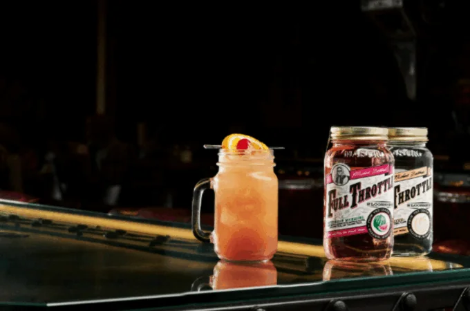 Easy Cocktails Using Spirits featuring a moonshine cocktail with Full Throttle Distillery jars